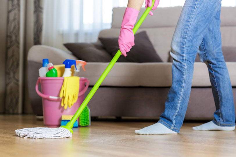 woman mopping home floor