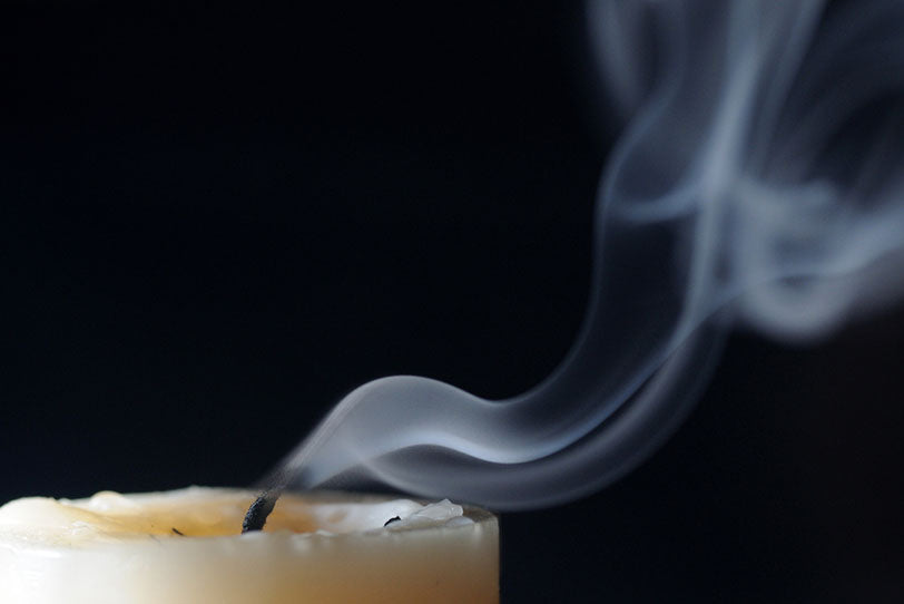 candle with smoke