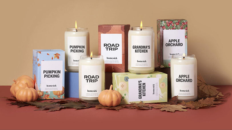 collection of candles in autumn layout