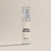 A bottle of the Beach Cottage Room Spray.