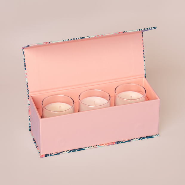 Three small candles in a box