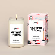 Getting It Done candle and box on a cream background