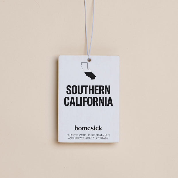 The Southern California Car Freshener shot on a cream background.
