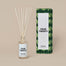 The Four Twenty Reed Diffuser shot next to its packaging shot on a dark gray background.