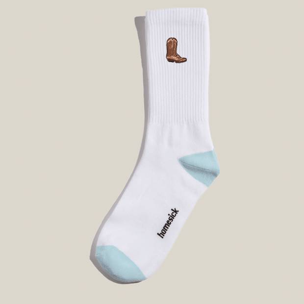 The high rise socks with a cowboy icon on the top part of the side calf